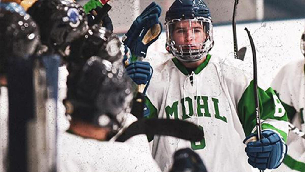 Kyle Gaffney goes through the handshake line at the MDHL Showcase.