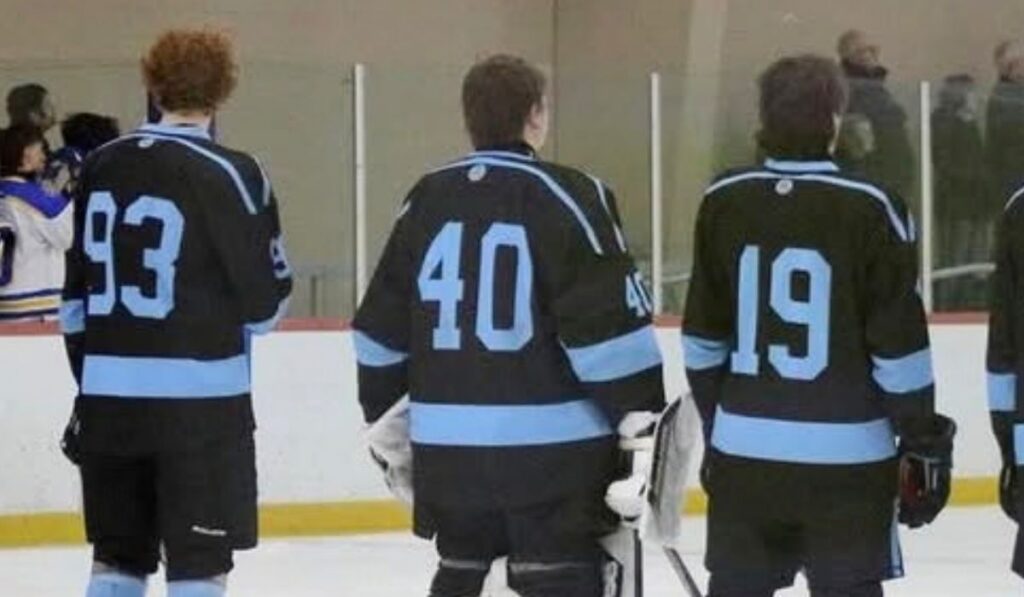 Defensive trio of Jake Rau (93, left), goalie Hunter Swing (40, middle) and Max Miller (19, right) makes Tri-Valley Thunder hockey the preseason favorite to win the Mid-Michigan Hockey Conference (MMHC).