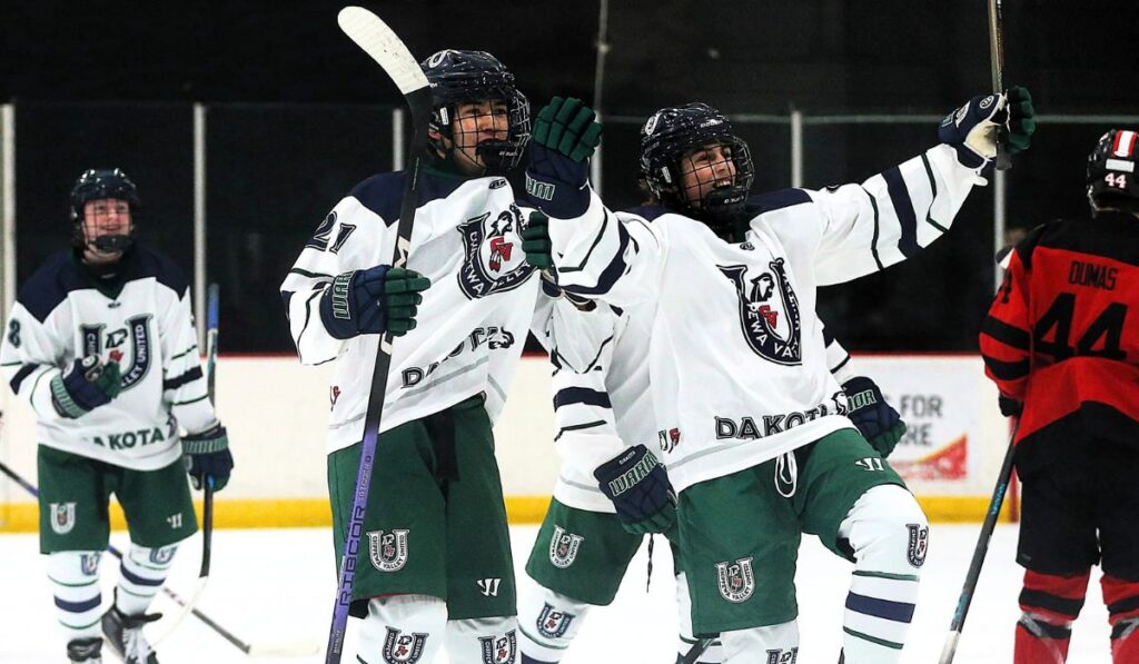 Chippewa Valley United hockey forward Caileb Peterson celebrates after scoring a goal