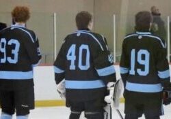 Defensive trio of Jake Rau (93, left), goalie Hunter Swing (40, middle) and Max Miller (19, right) makes Tri-Valley Thunder hockey the preseason favorite to win the Mid-Michigan Hockey Conference (MMHC).