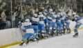 Livonia Stevenson hockey rushes the ice and jumps into the glass celebrating in front of the student section.
